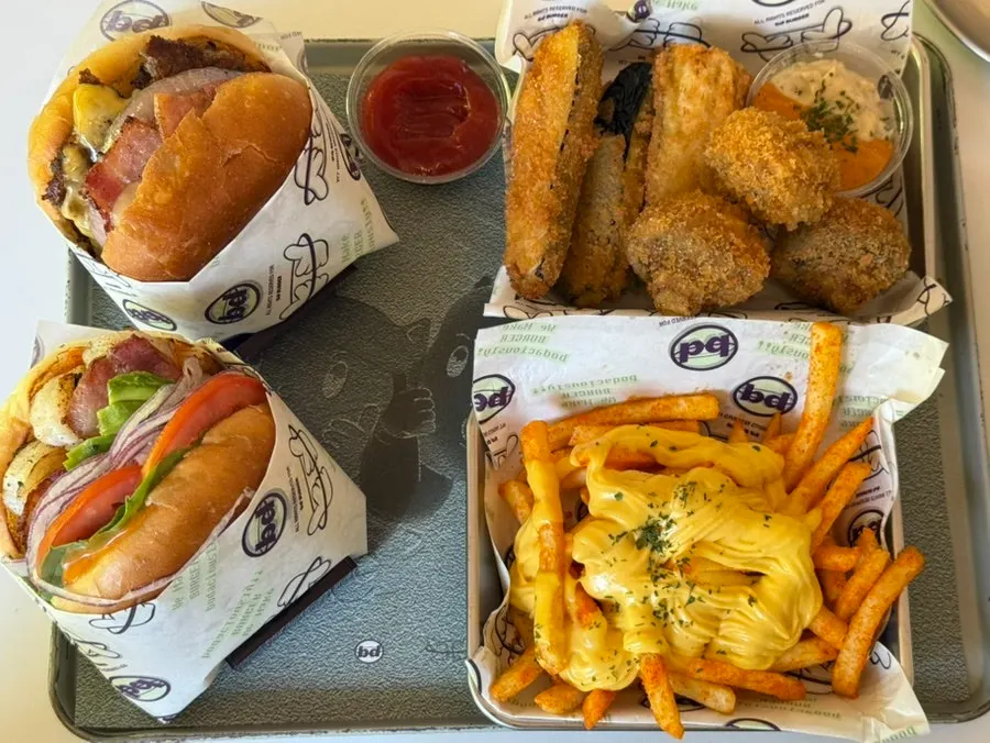 Two burger sets laid out on the table