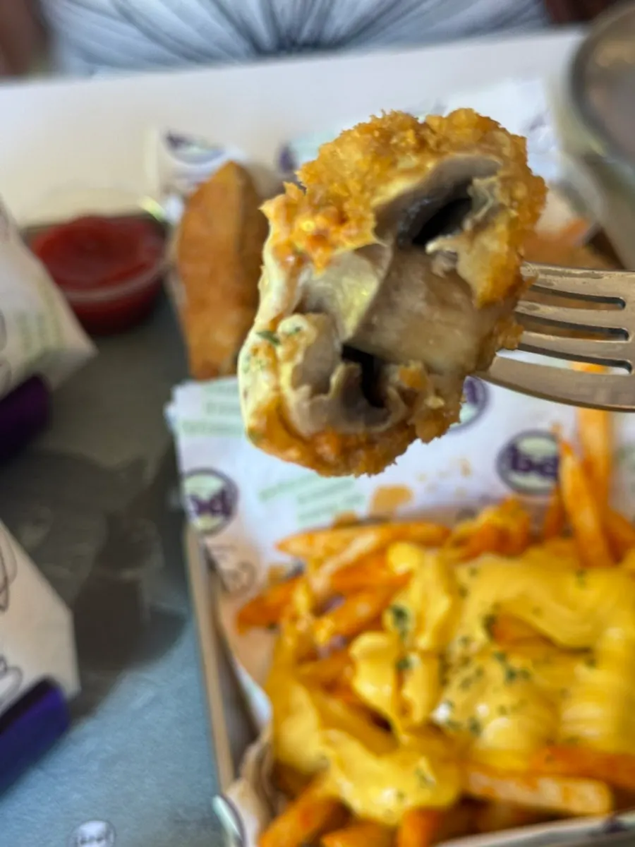 Cross-section of a crispy mushroom fritter