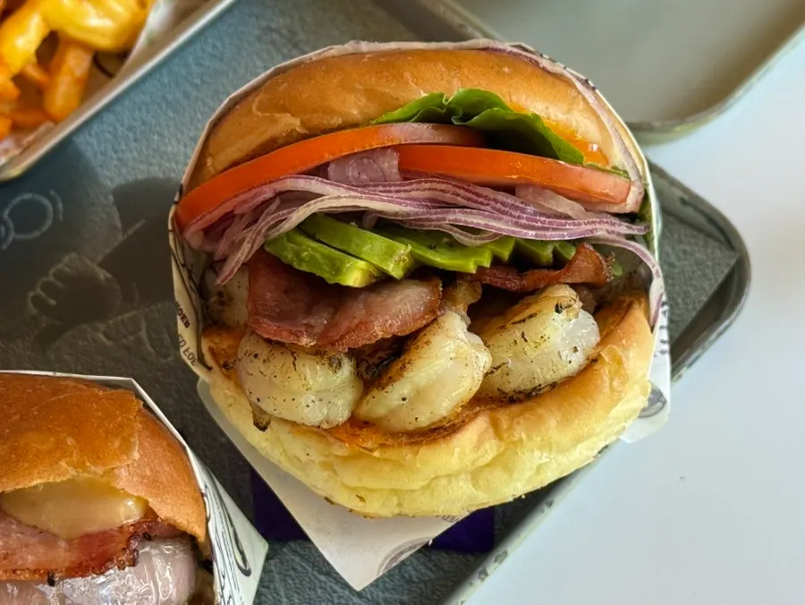Two handmade burgers packed with fillings