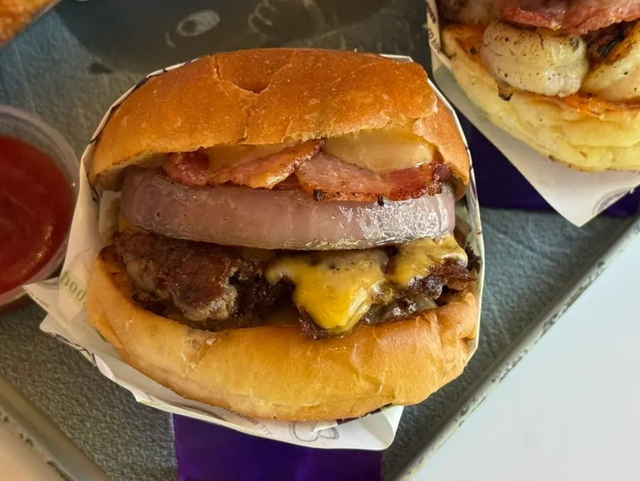 Cross-section of the burger showing shrimp and avocado