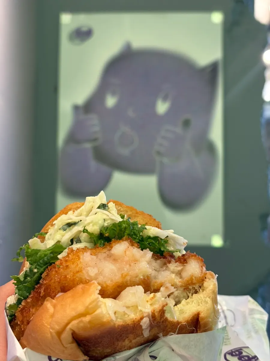 Burger and eggplant fritters together on the table