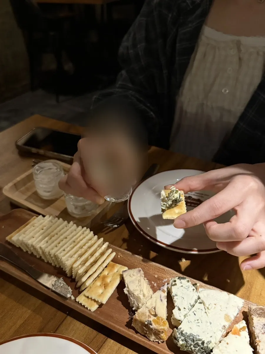 Cross-section of cream cheese studded with dried fruit