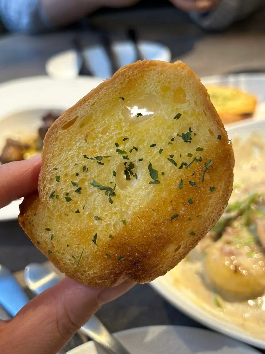 Baguette served alongside the gnocchi