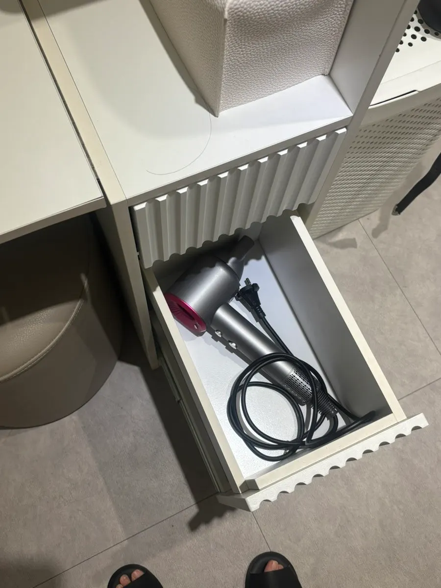 Hair dryer and dry shampoo prepared in the powder room
