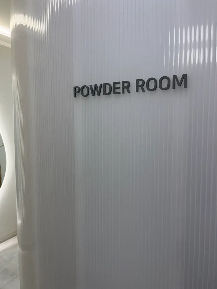 Powder room with dry shampoo and a Dyson hair dryer