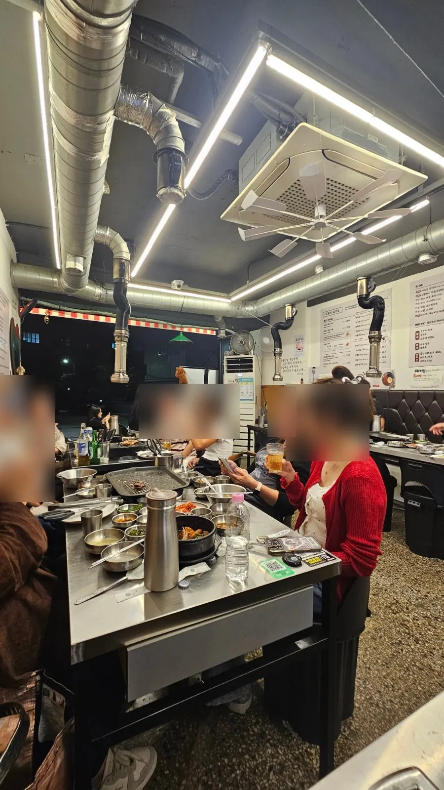 Fully booked terrace seating at Beefjeong