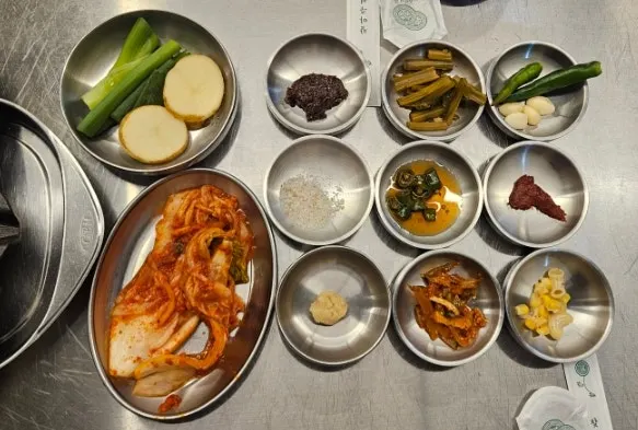 Beefjeong's basic table setting served in stainless steel dishes