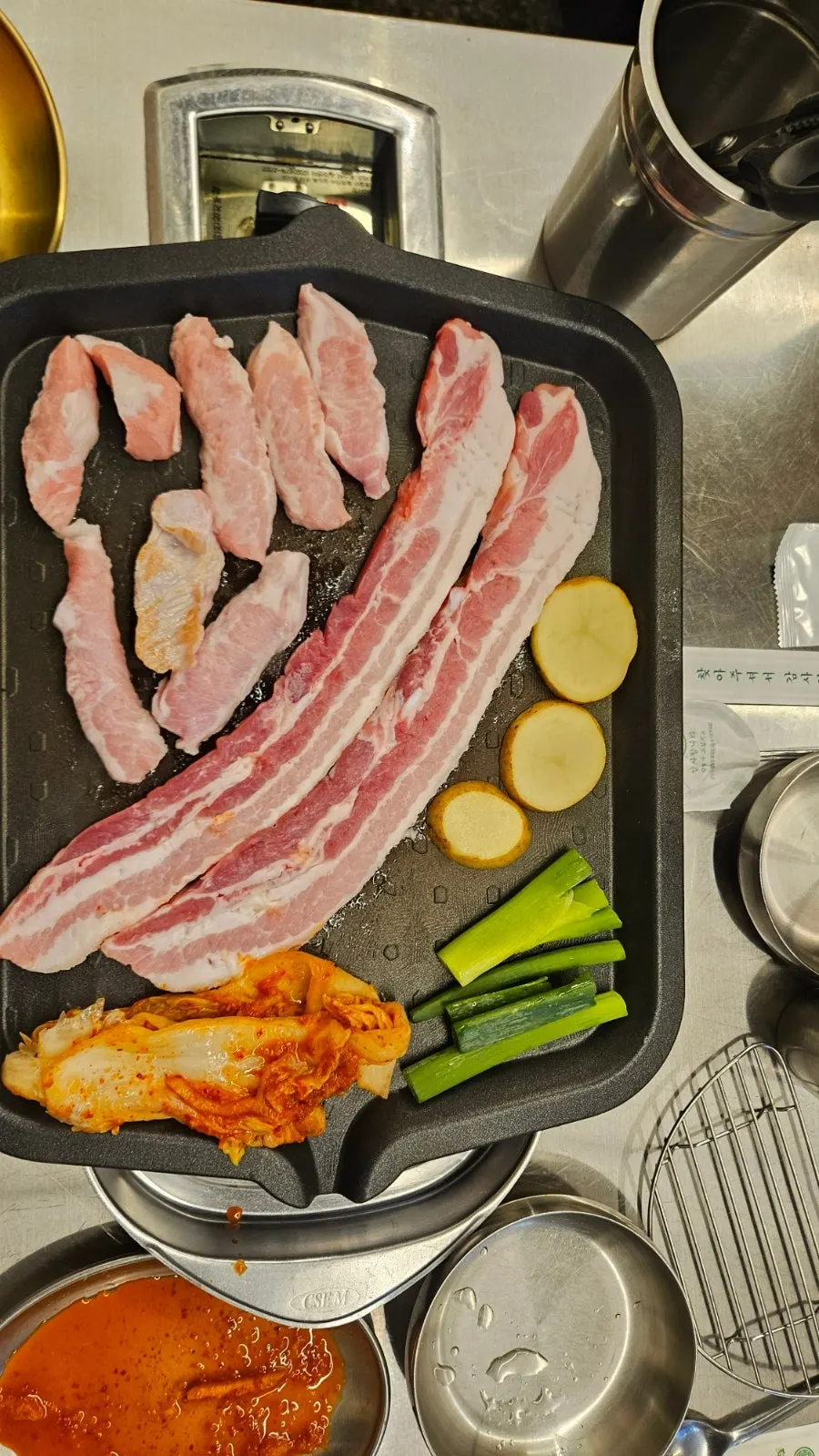 Beefjeong's meat cake with a candle stuck in it