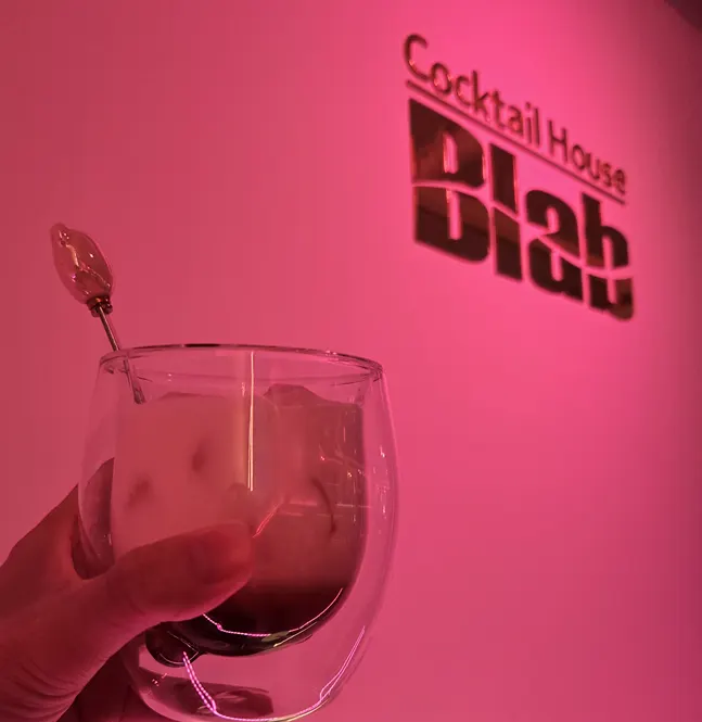 A soft, milk-based cocktail glass
