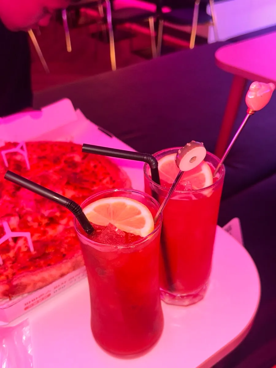 Two glasses: strawberry highball and V-Lab grapefruit