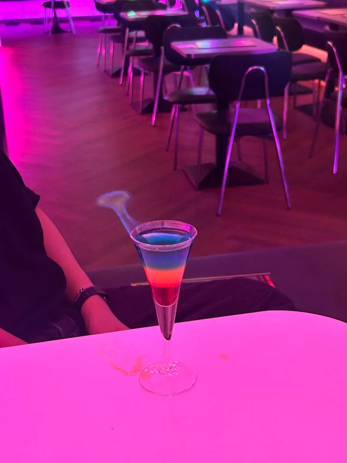 A glass of vodka-based cocktail