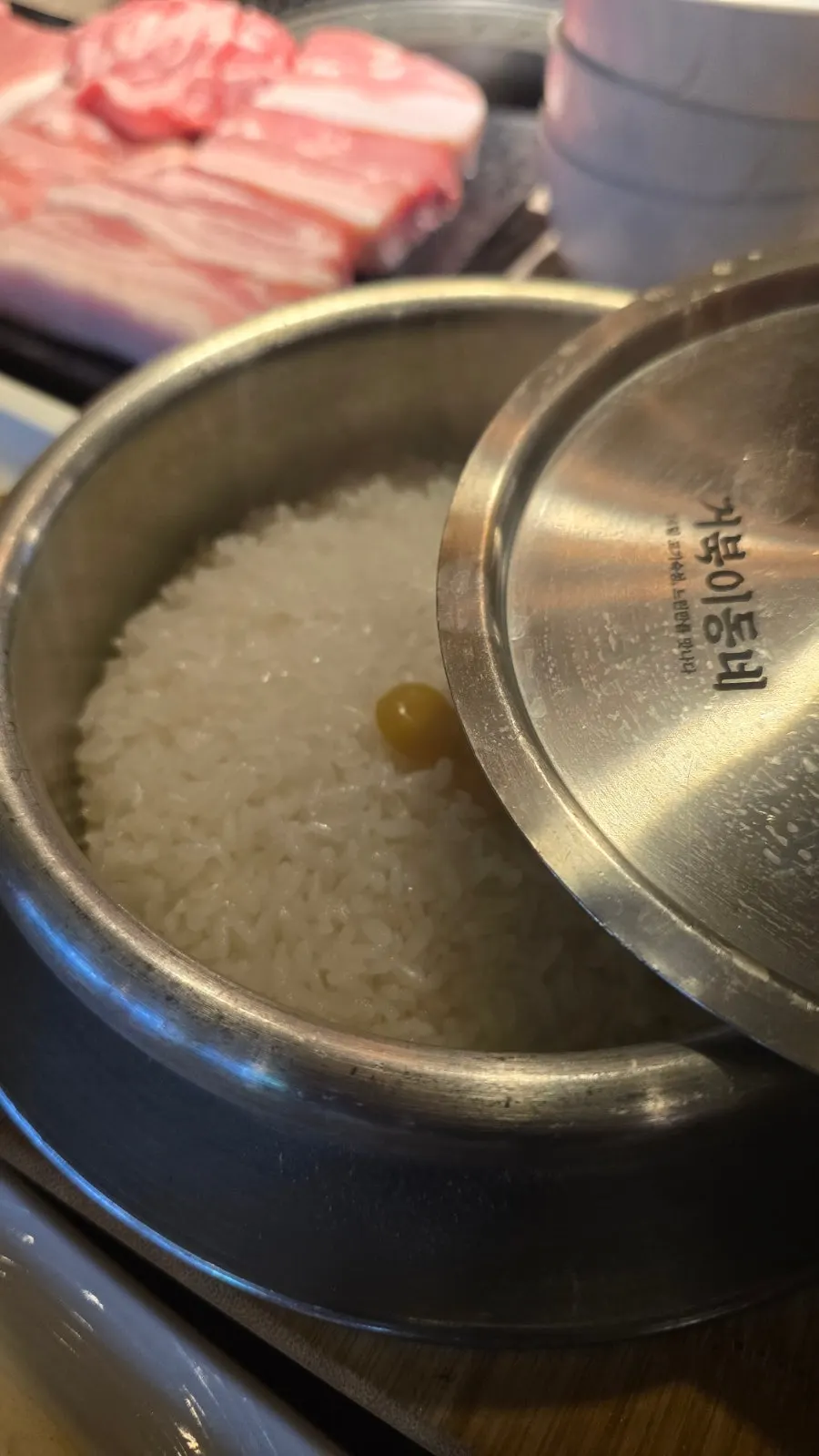 Freshly cooked pot rice with steam rising