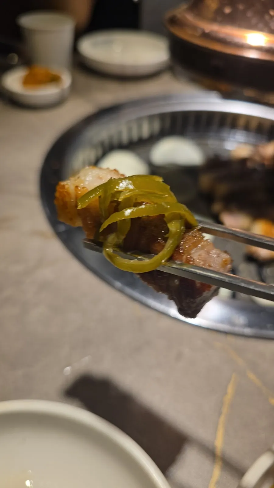 A full spread of meat with self-serve bar side dishes