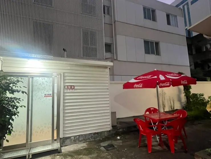 Exterior of the pork belly restaurant with its original house structure