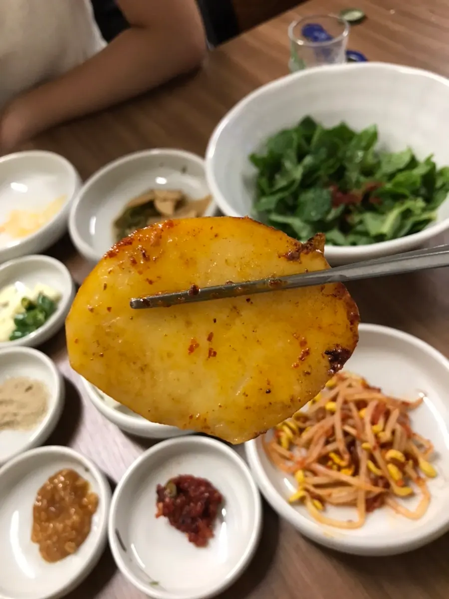 A refilled plate of stir-fried kimchi