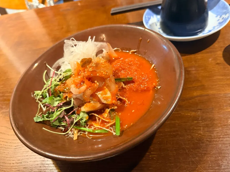 Aged sashimi served with dipping sauce