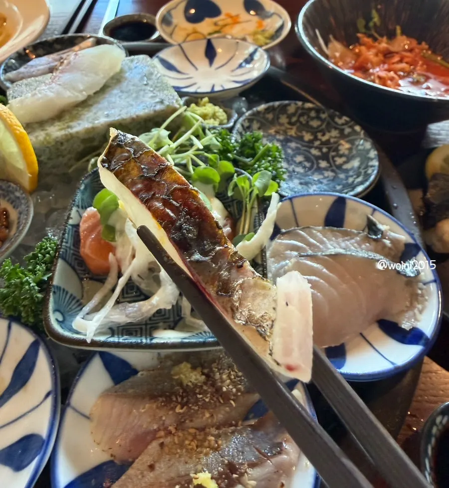 Aged sashimi and sushi laid out on the table