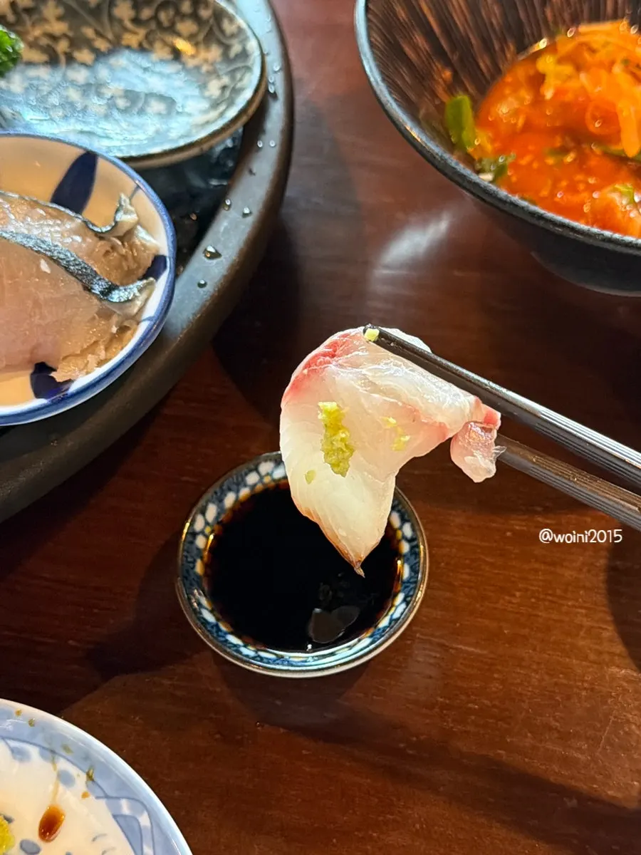 Aged sashimi dipped in house-made soy sauce