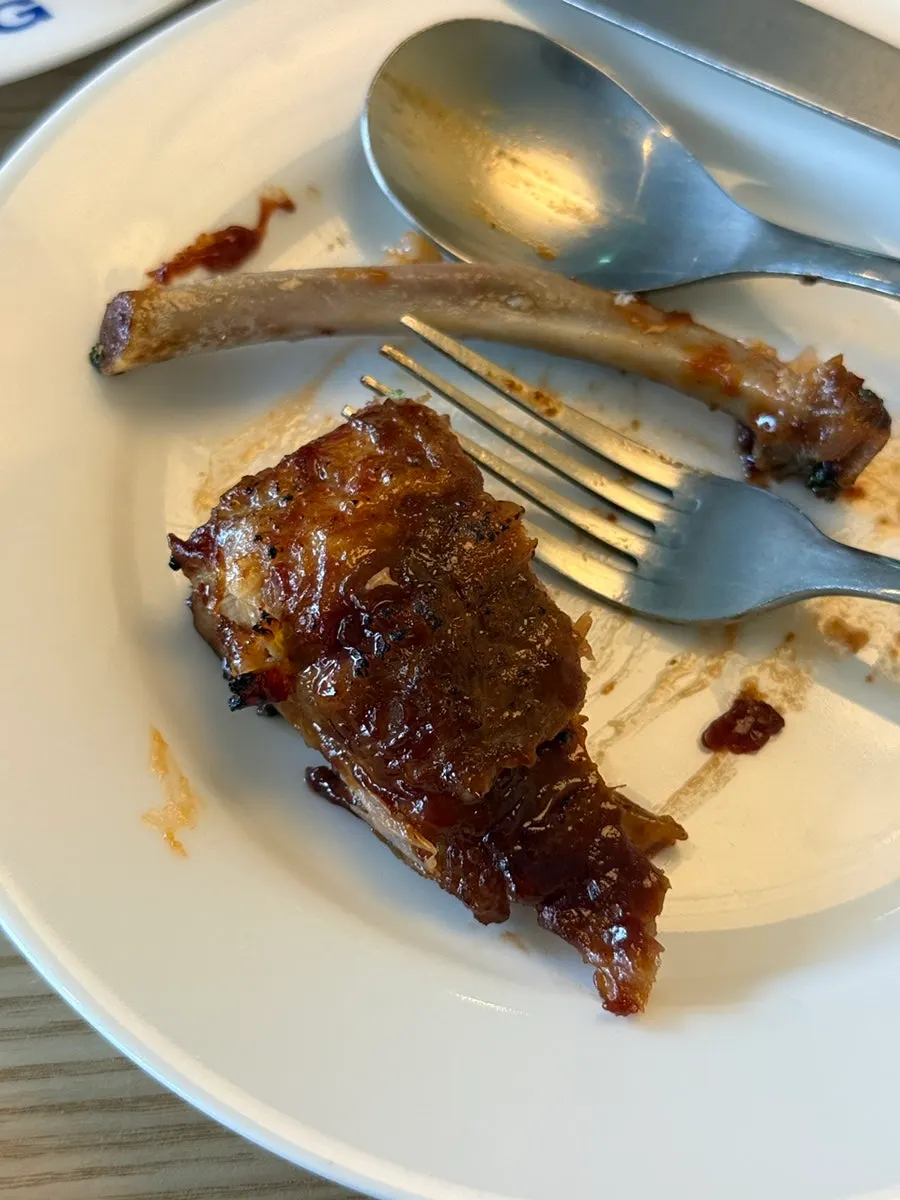 Close-up of the pork ribs coated in BBQ sauce