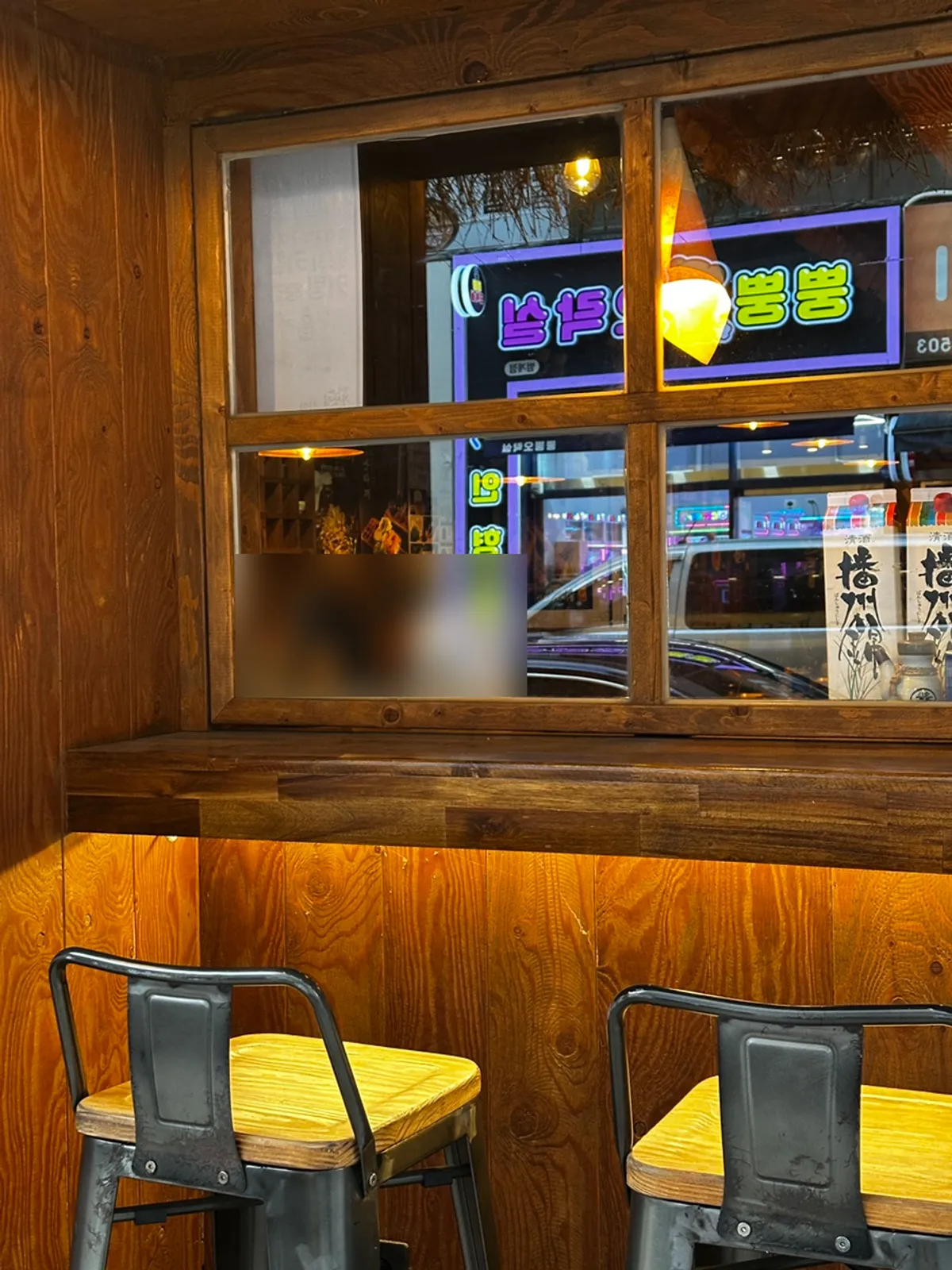 Long counter seating in front of the kitchen