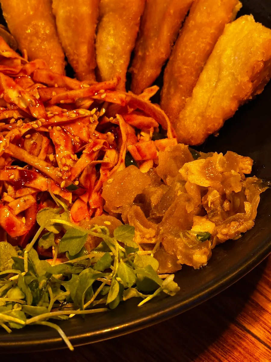 Plump whelks served with marinated cabbage salad