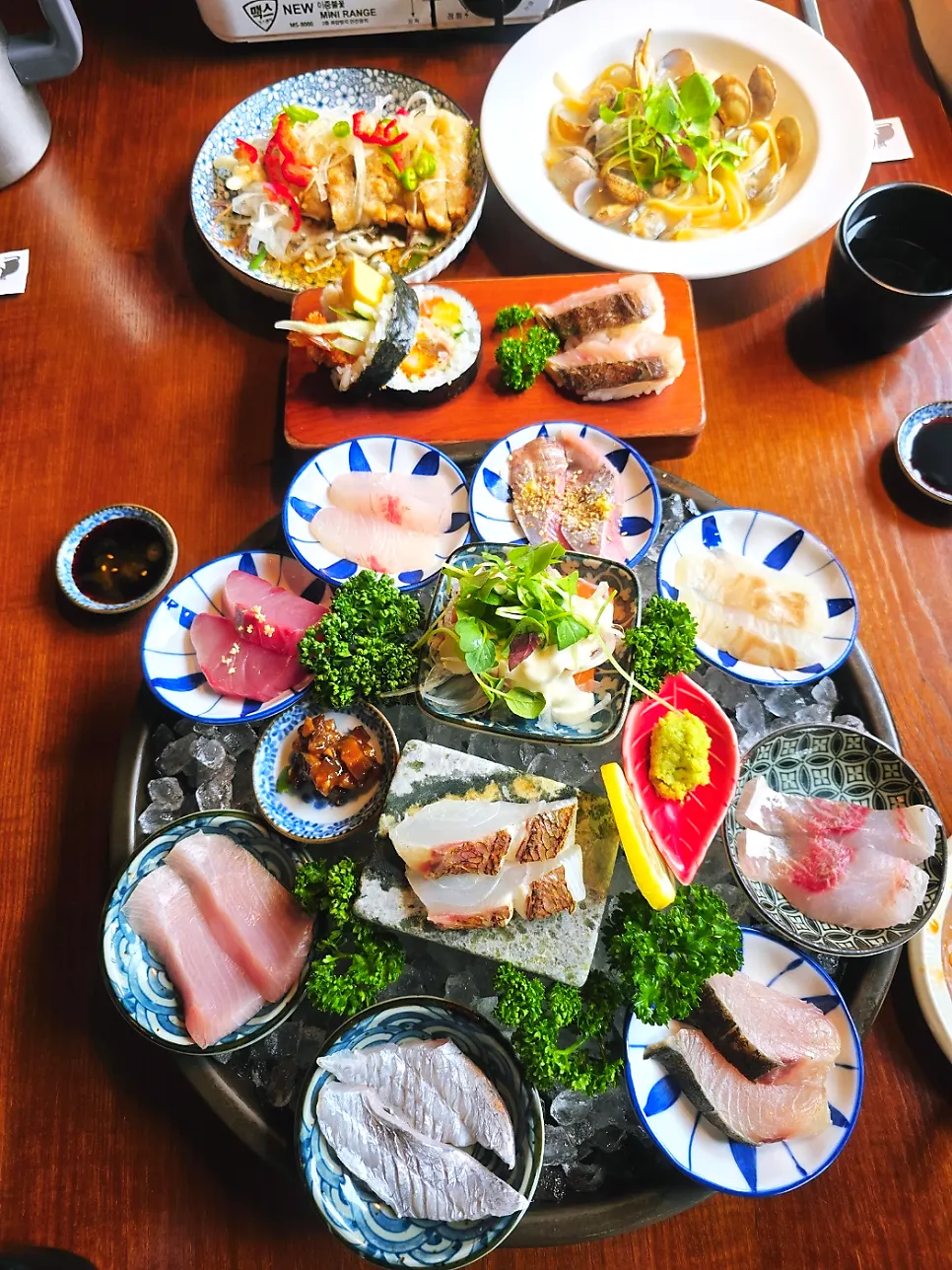 Sushi and futomaki following the aged sashimi