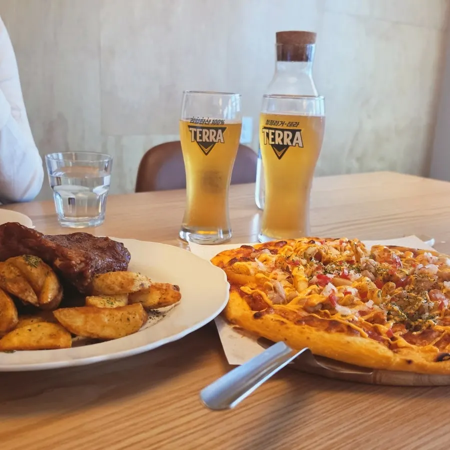 Pizza and pork rib half order combo, good for two people at lunch