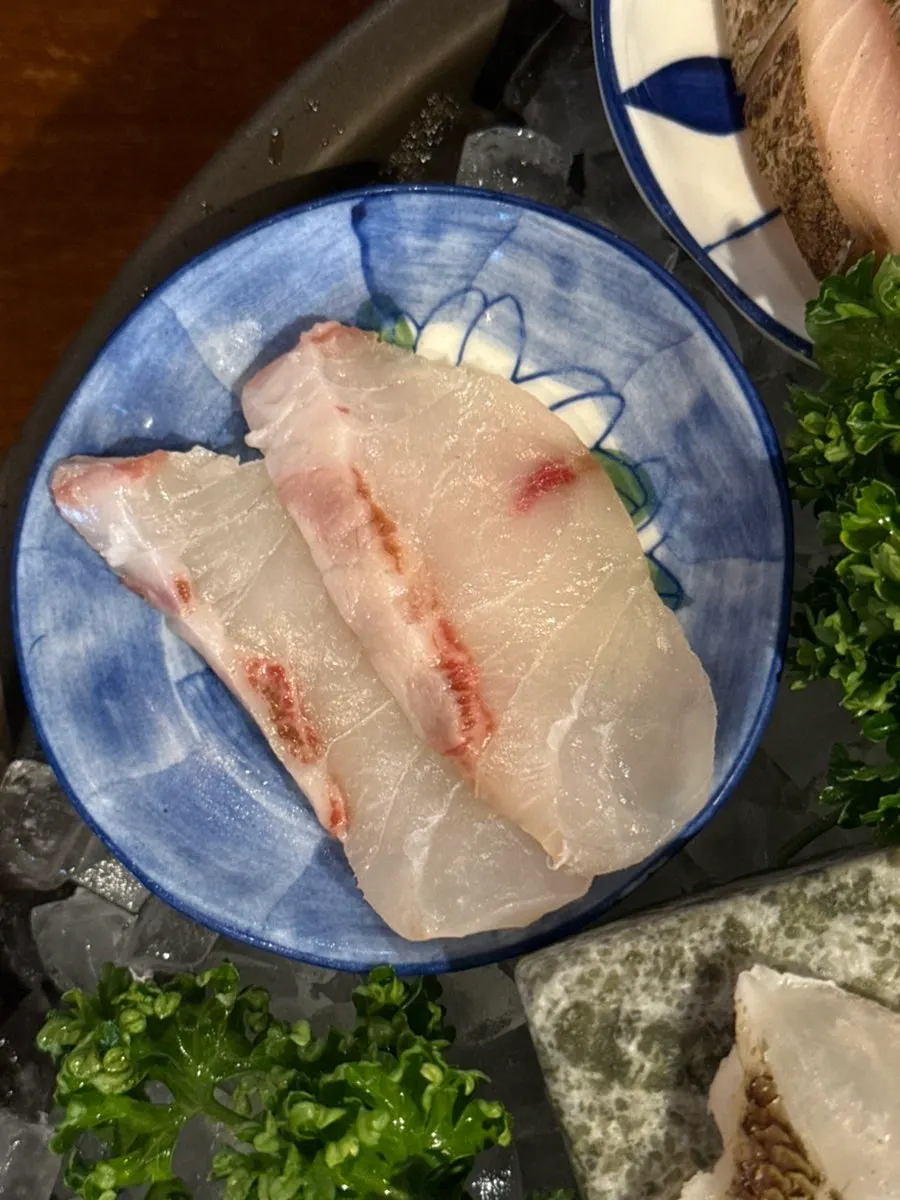 A piece of croaker aged sashimi