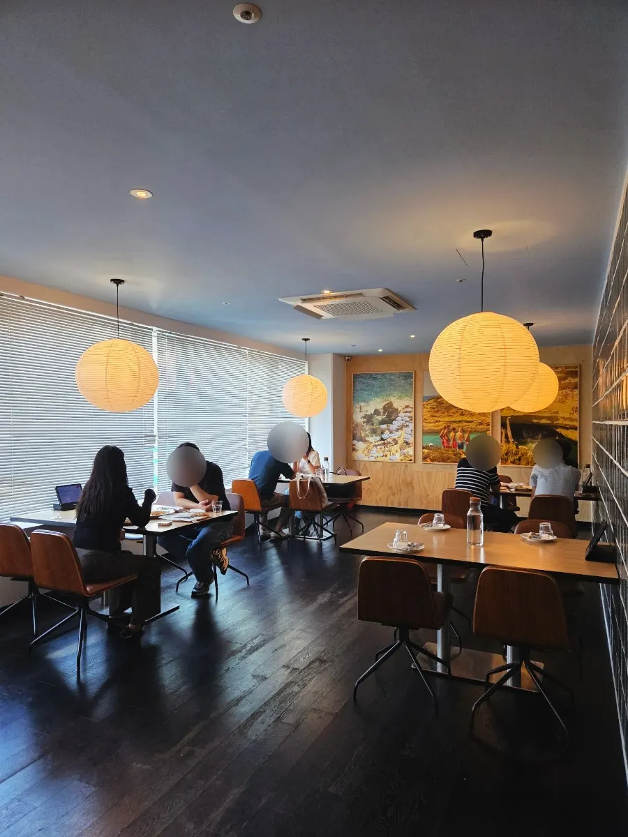 Dimly lit interior of Two Find Peter Beomgye Branch