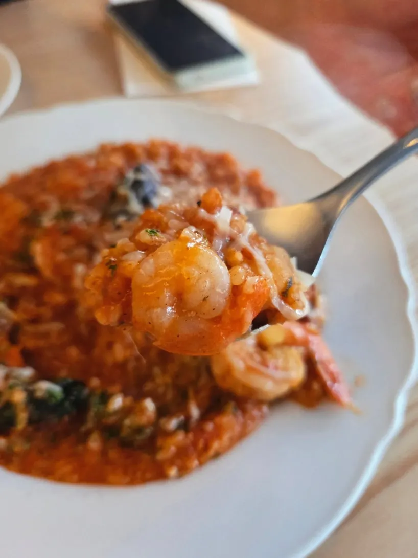 Plump shrimp inside the risotto