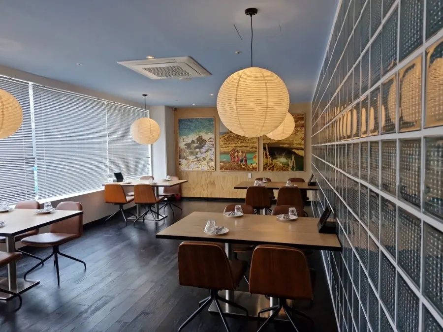 Seating at Two Find Peter Beomgye Branch with wide table spacing