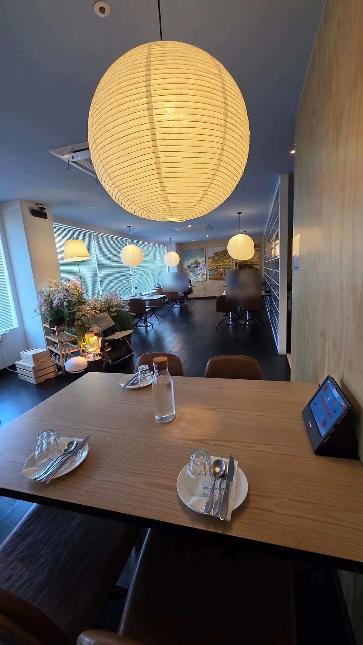 Dining hall at Two Find Peter Beomgye Branch with wide table spacing