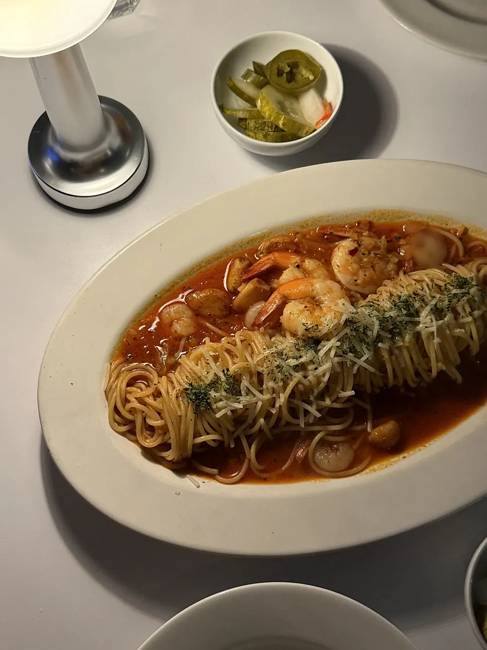 Close-up of the pasta showing large shrimp