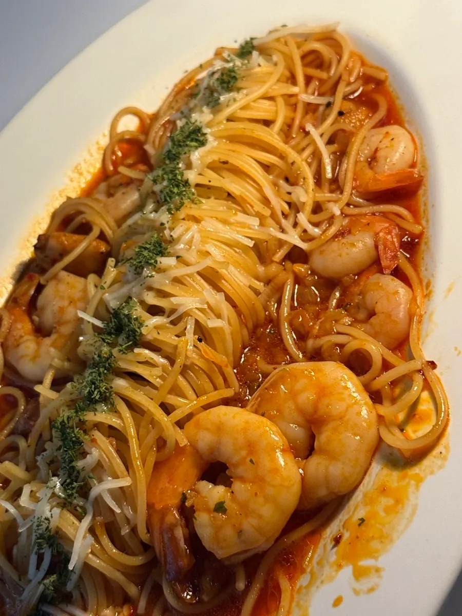 Close-up of pasta loaded with whole garlic cloves