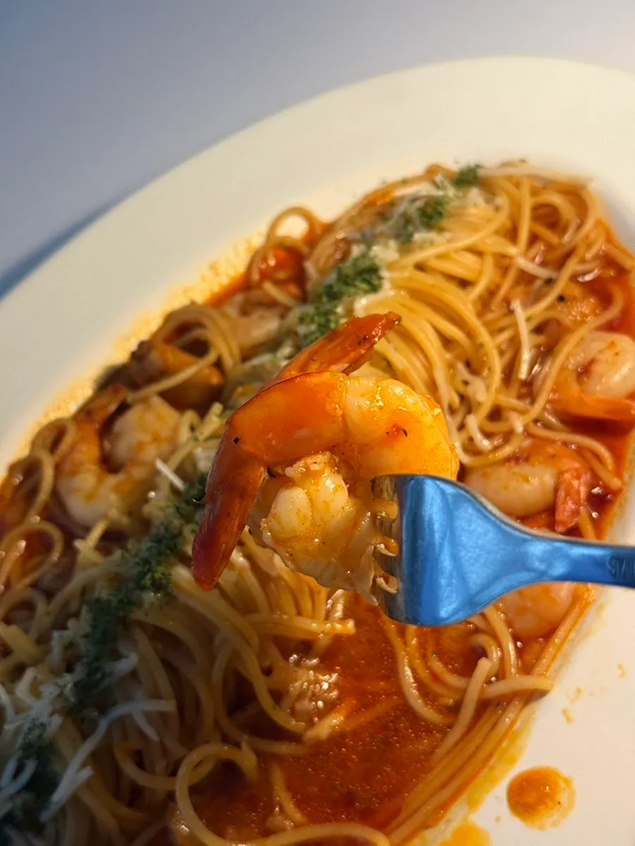 Plump shrimp on top of the pasta
