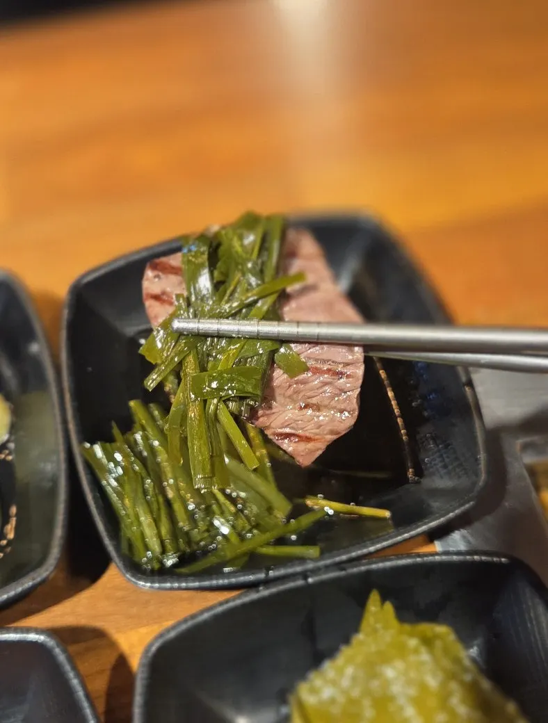 Eopjinsal served with soy-pickled onions