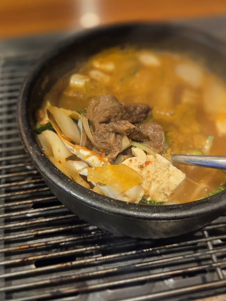A hearty bowl of haemul doenjang loaded with ingredients