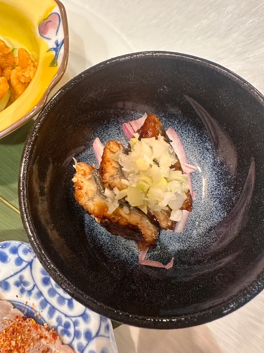 Uni, eel, and skate served in the course