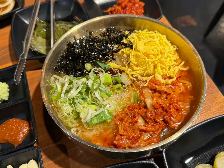 Kimchi cold noodles at Hanuso Dwitgogi Beomil Branch