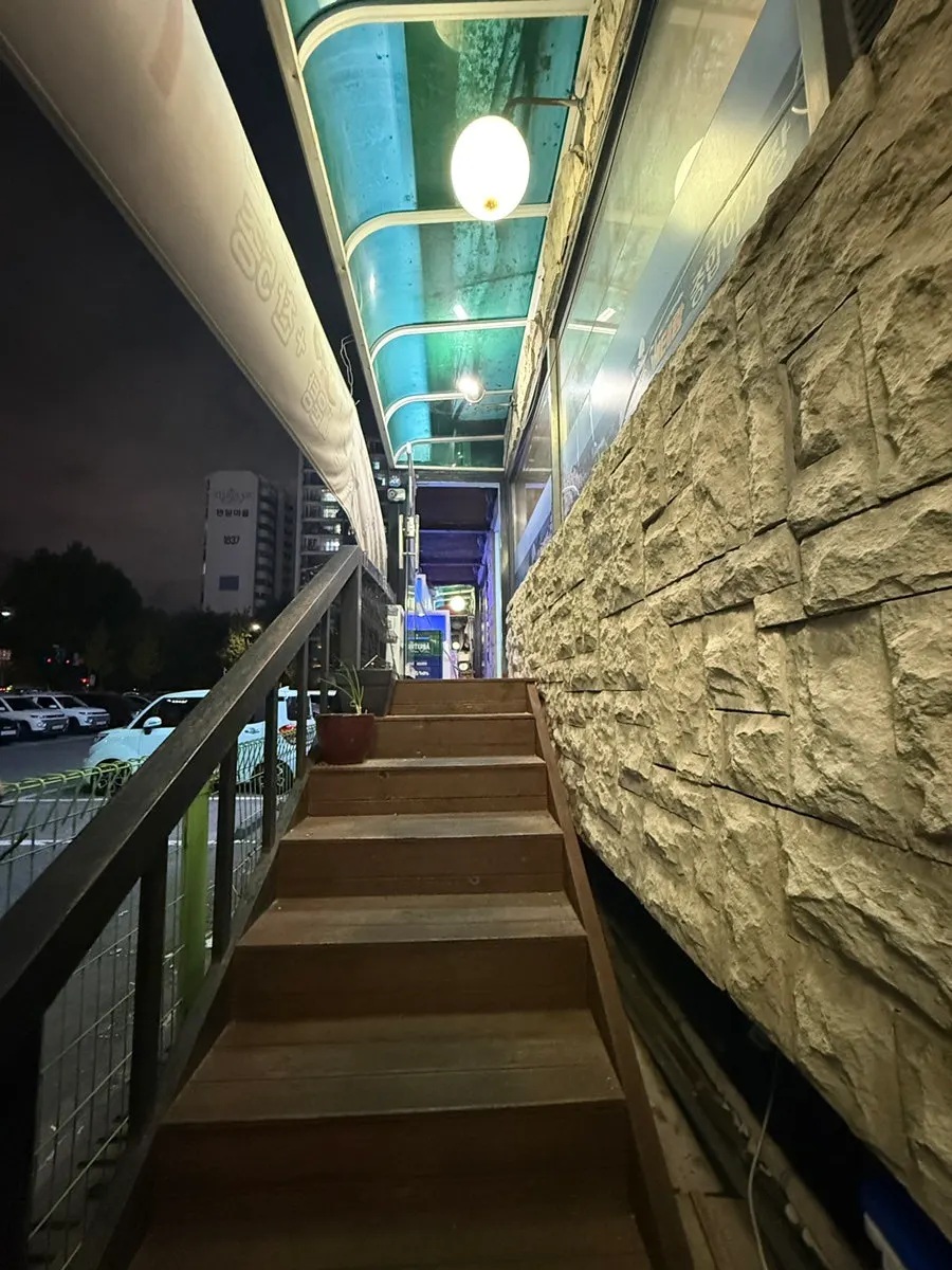 Staircase entrance leading up to the restaurant
