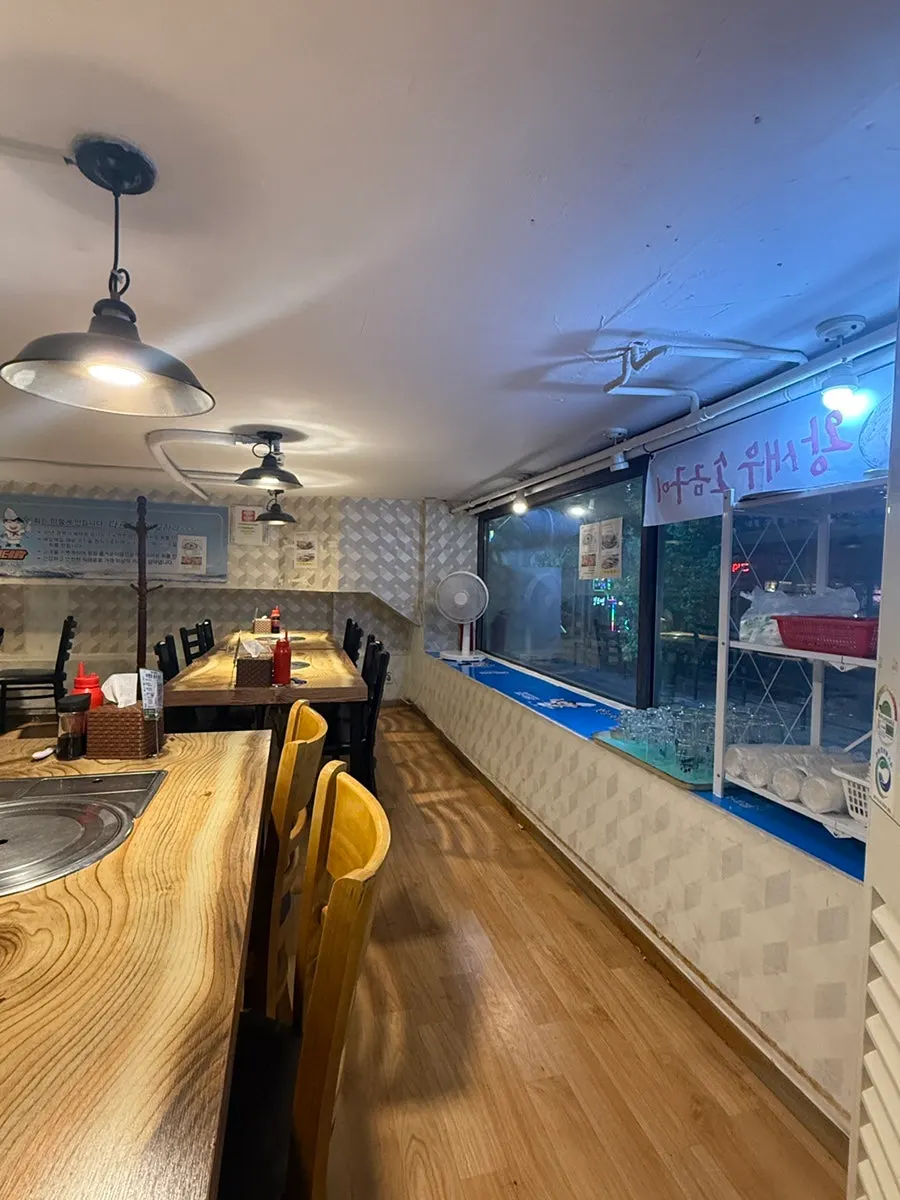 Group seating area in the back on the half-floor above