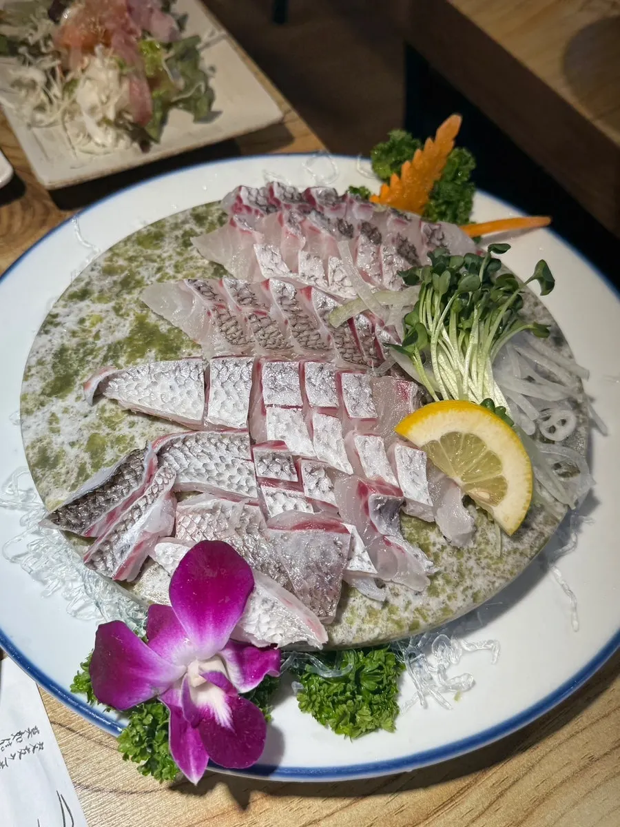A plate of mini red seabream sashimi served maskkawa style