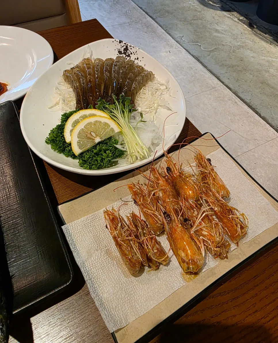 Plate of mini raw shrimp sashimi with 9 shrimp
