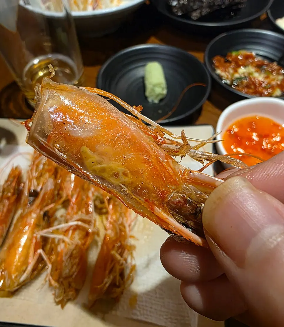 Close-up of plump raw shrimp sashimi