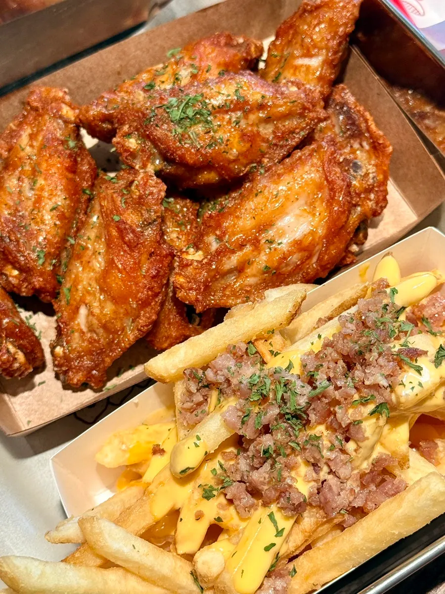 Buffalo chicken wings and cheese bacon fries