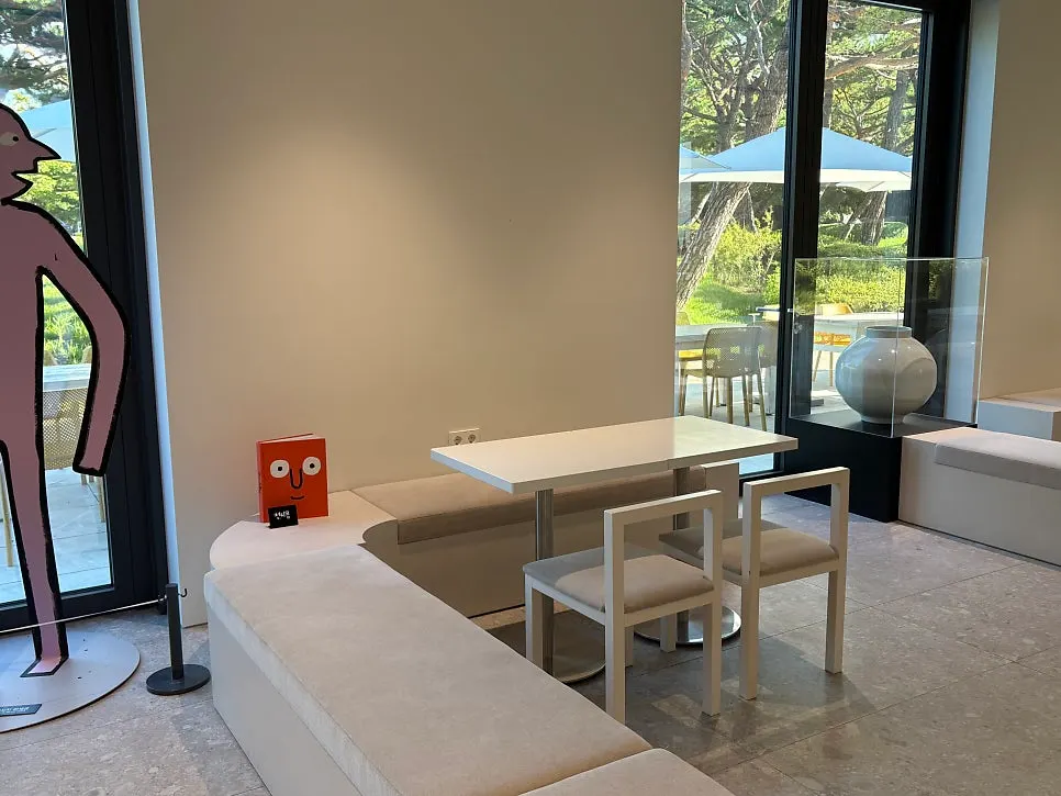 Artwork and seating inside the café
