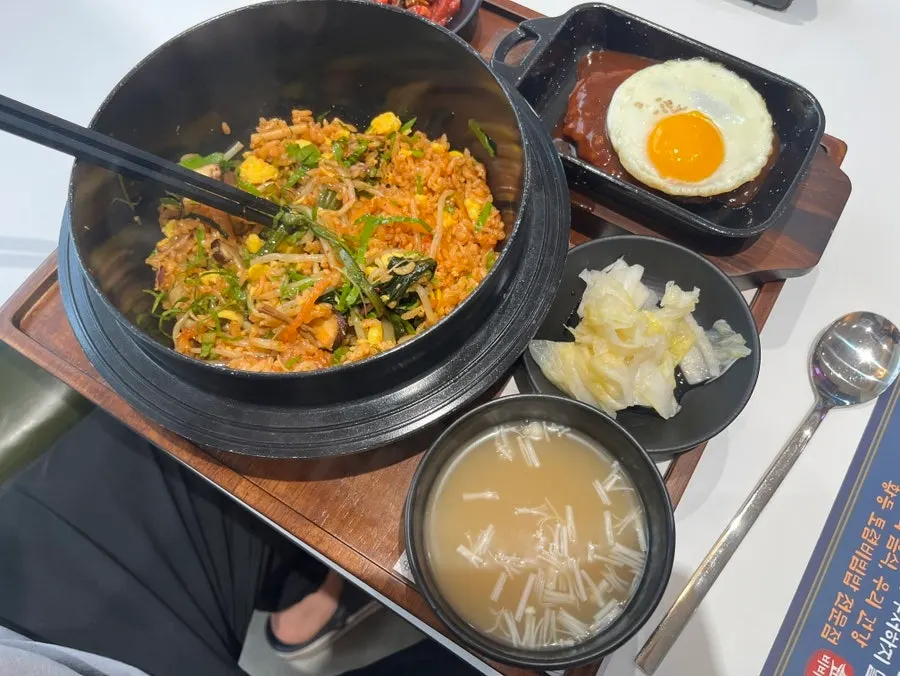 Seasoned hanwoo beef tartare served beside namul bibimbap
