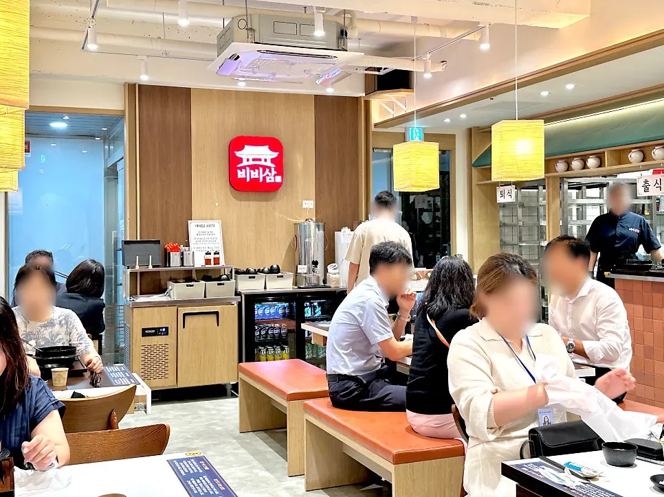 Busy interior of Bibisam Gwacheon Main Branch at lunch