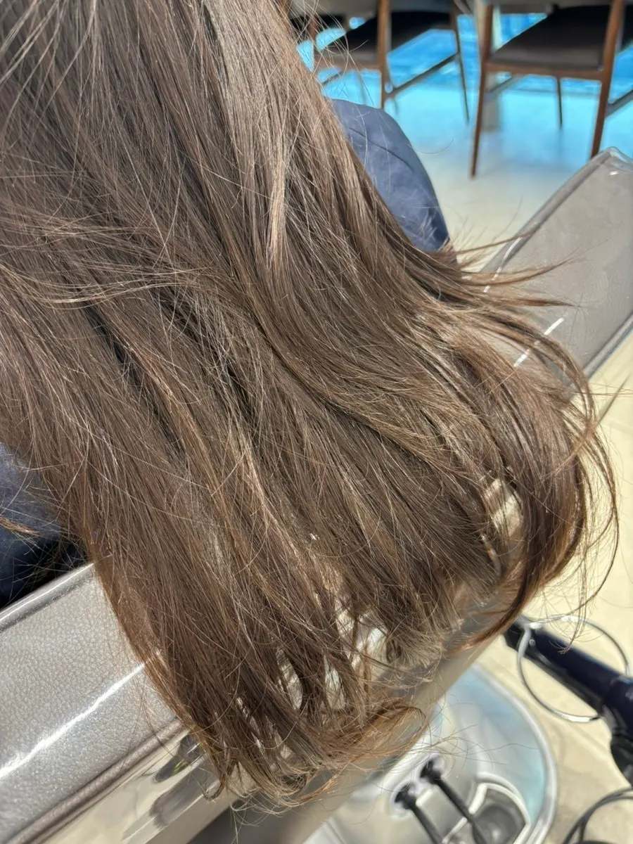Close-up of split, damaged hair ends