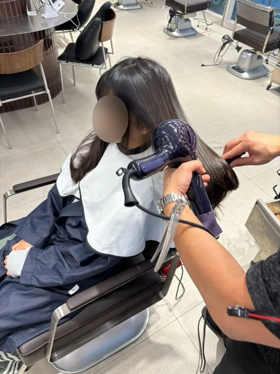 Finished blow-dry after the clinic treatment